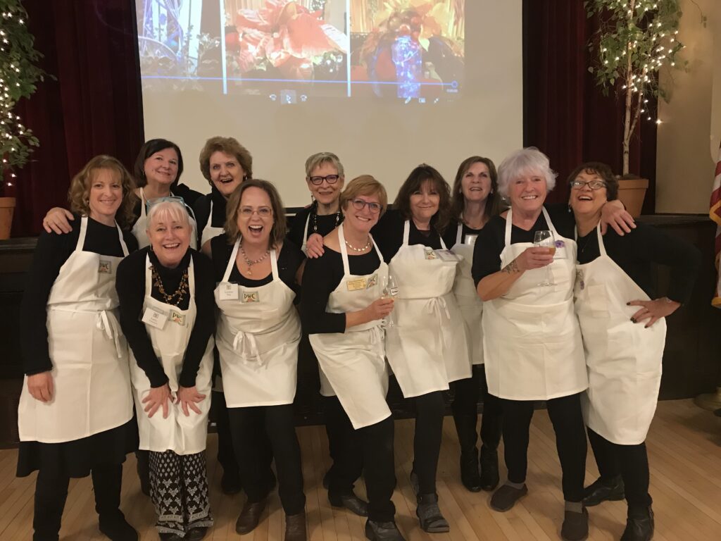 Committee PWC Committee members for a dinner event.