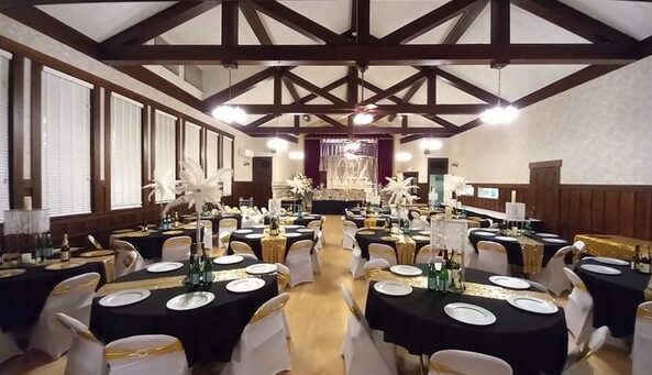 Clubhouse Event Space set up with black and gold decorations.